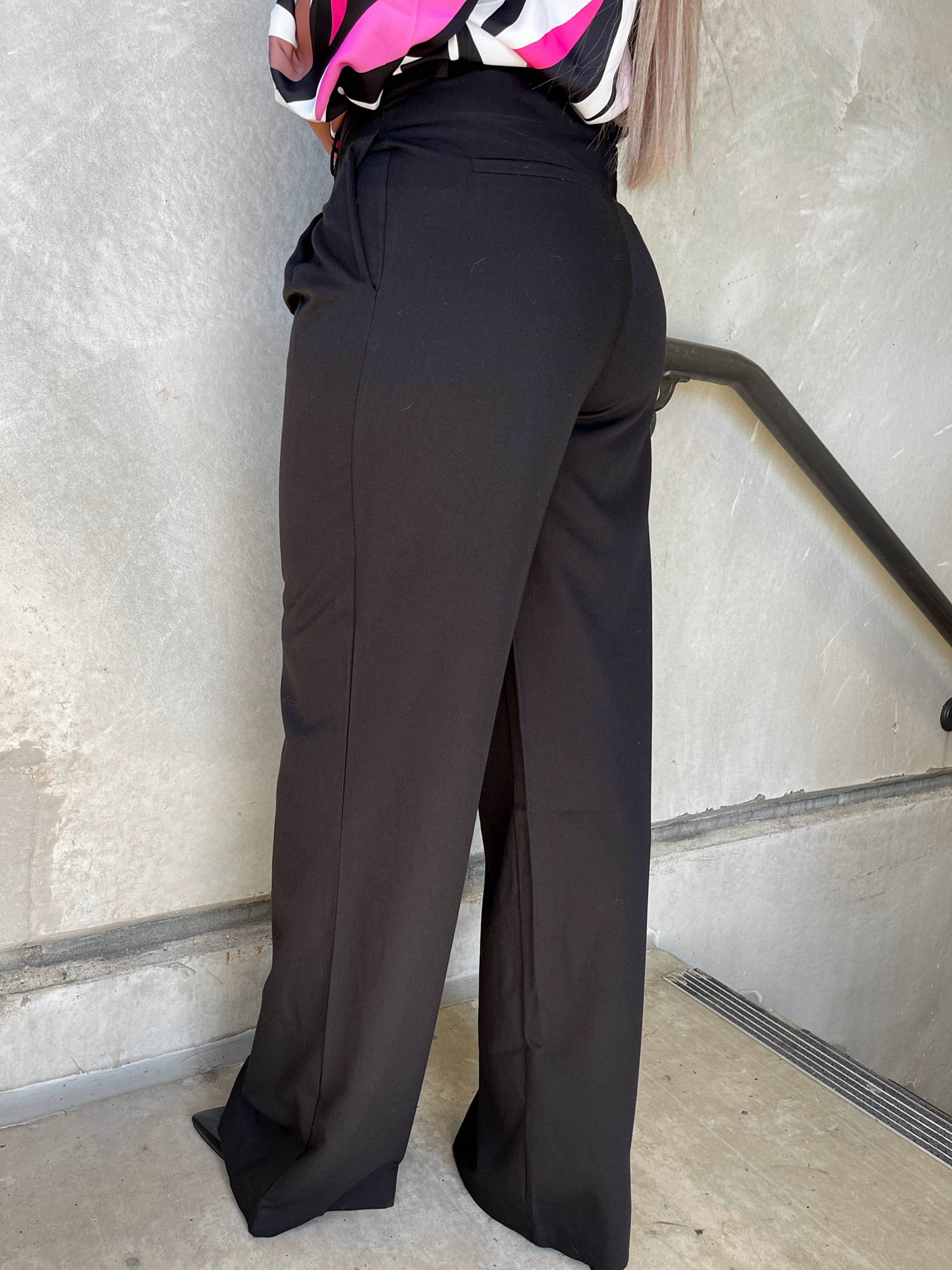 black relaxed pleated trousers
